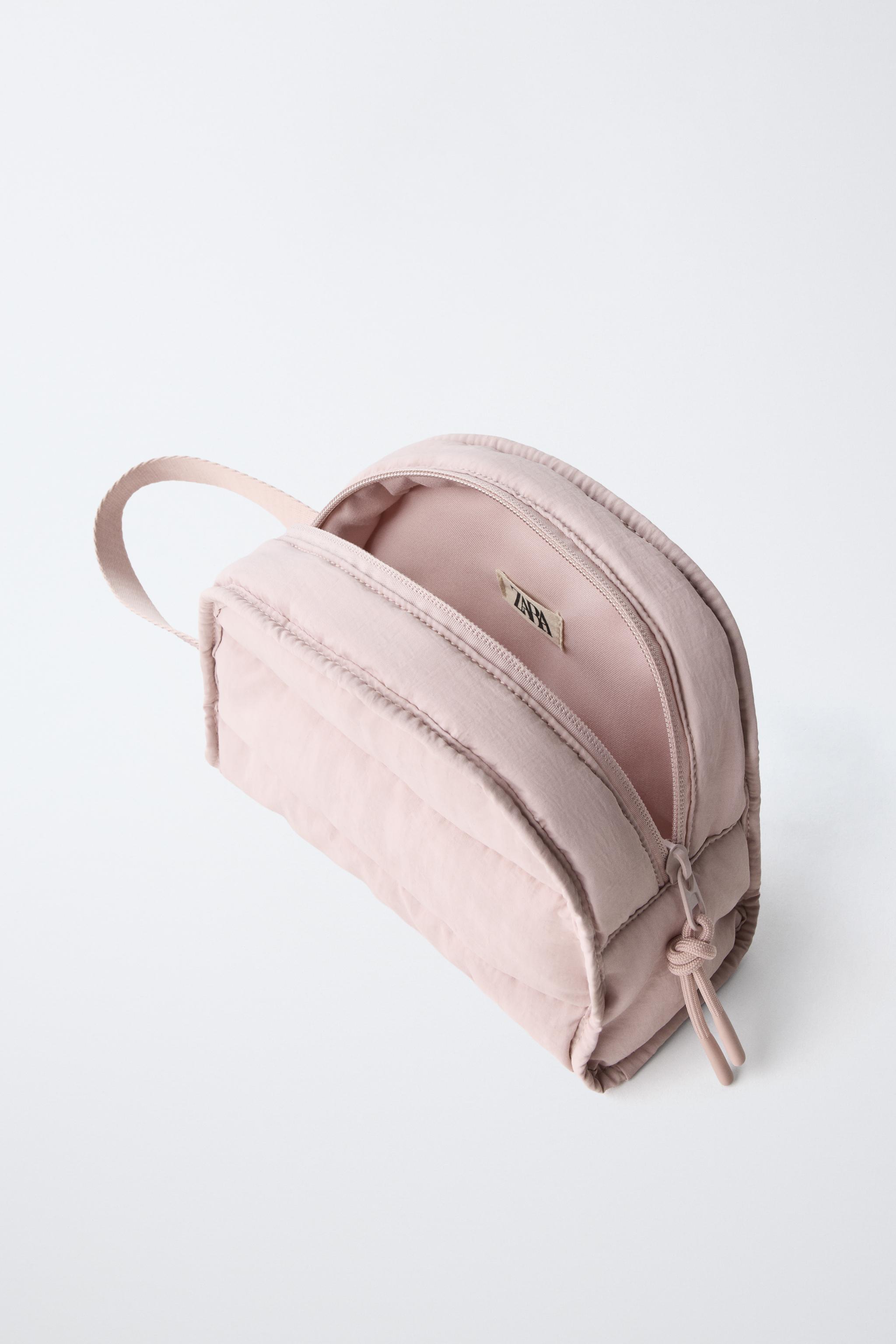 QUILTED TOILETRY BAG